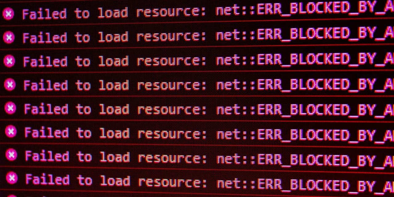 Close up of computer screen showing a error code.