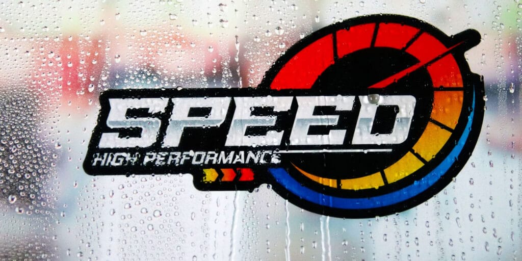 A photo showing website speed matters. It's shows as text on a glass window with condensation.