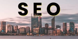 A picture of Perth city, Western Australia, with the words SEO superimposed behind in the skyline.